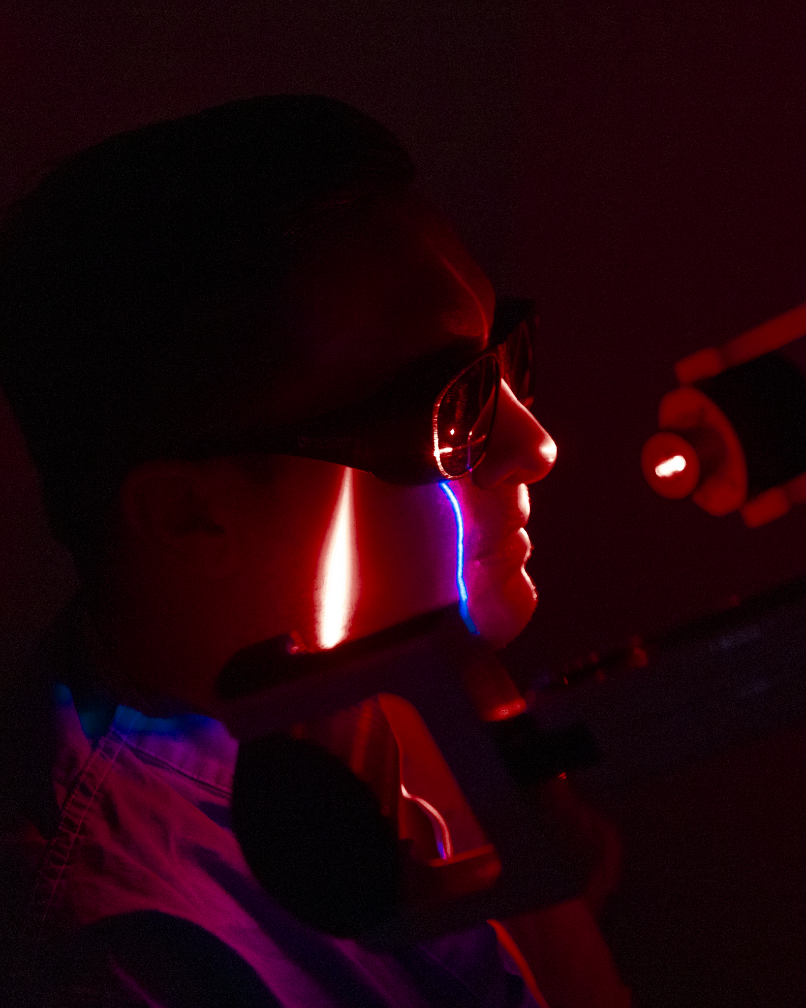 Patient receiving cold laser therapy on face